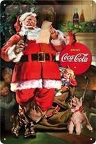 an old fashioned coca cola advertisement featuring santa claus and his dog, with the caption drink coke